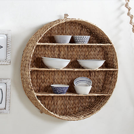 Round hyacinth wall shelf with natural woven storage design