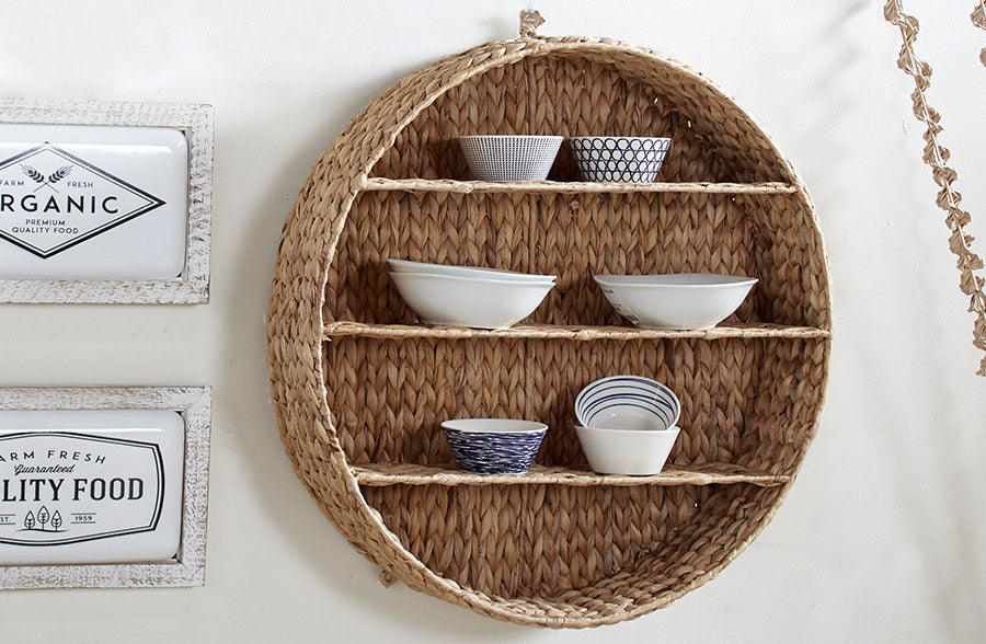 Round hyacinth wall shelf with natural woven storage design