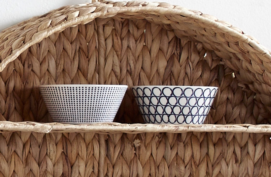 Round hyacinth wall shelf with natural woven storage design