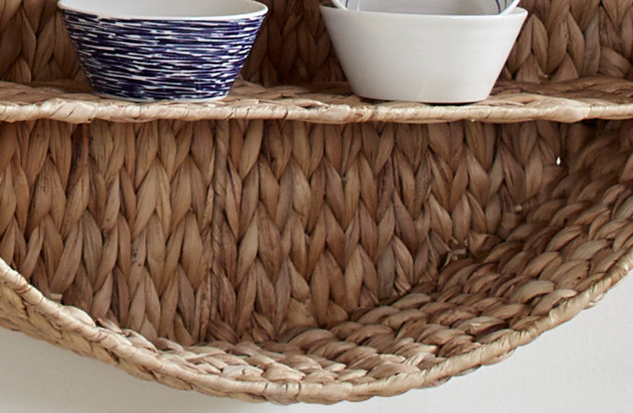 Round hyacinth wall shelf with natural woven storage design