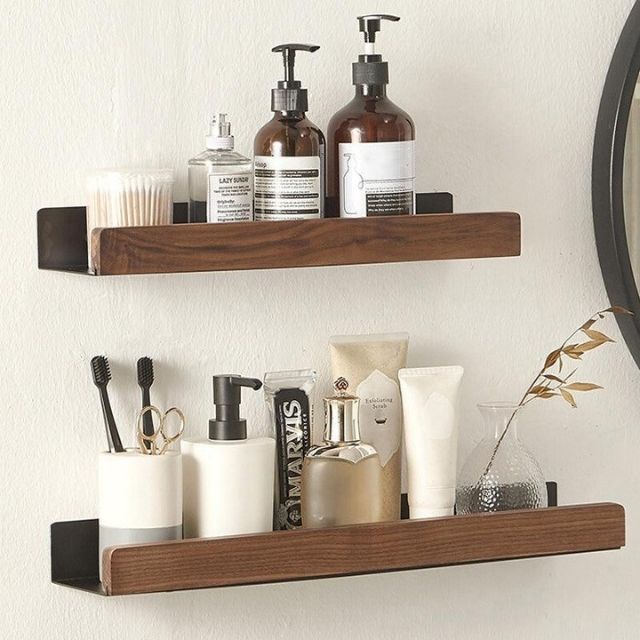 Wooden bathroom organizer shelf mounted with adhesive backing