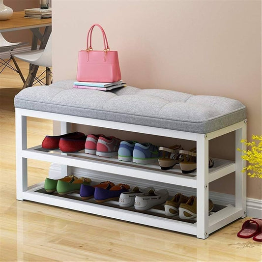Shoe storage bench in hallway with organised footwear