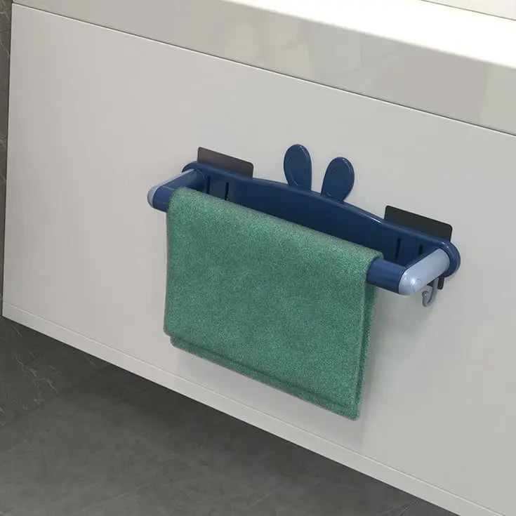 Wall-mounted metal shoe rack holding multiple pairs of shoes in a hallway