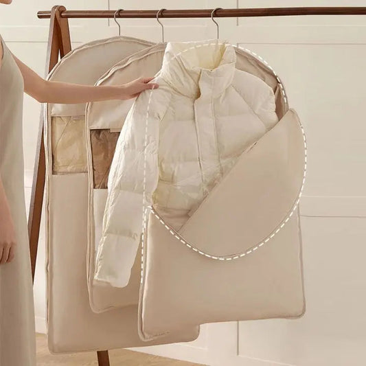 Airtight hanging storage bag protecting jackets and sweaters in wardrobe