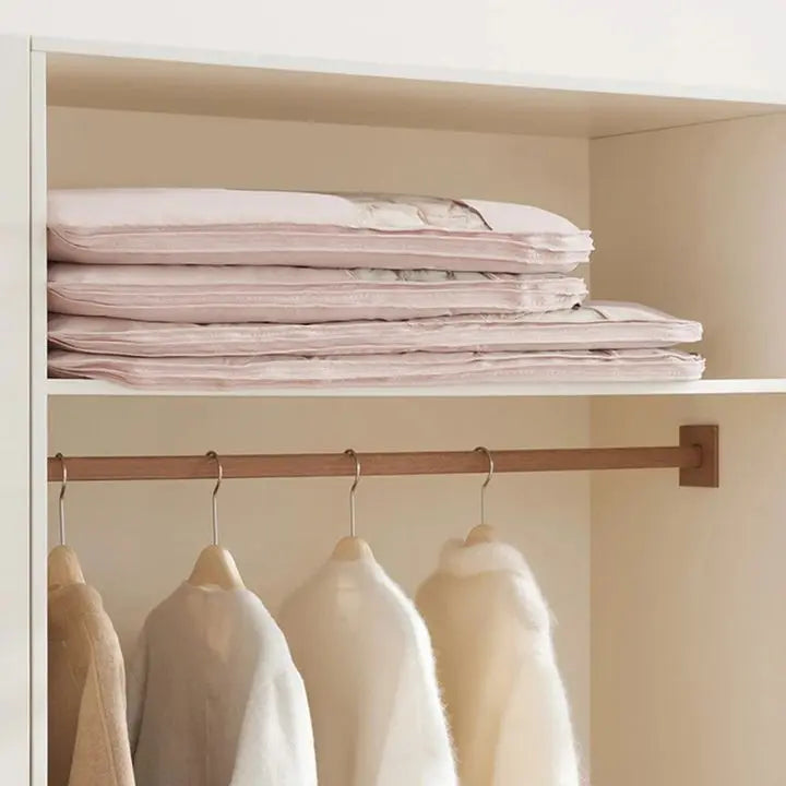 Airtight hanging storage bag protecting jackets and sweaters in wardrobe