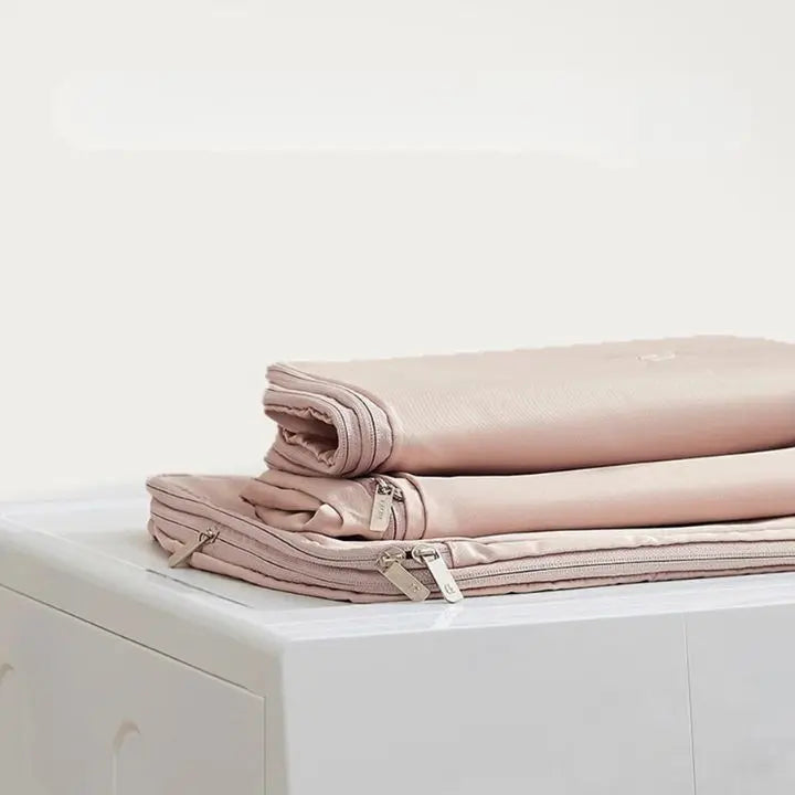 Airtight hanging storage bag protecting jackets and sweaters in wardrobe