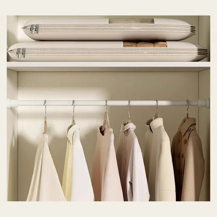 Airtight hanging storage bag protecting jackets and sweaters in wardrobe