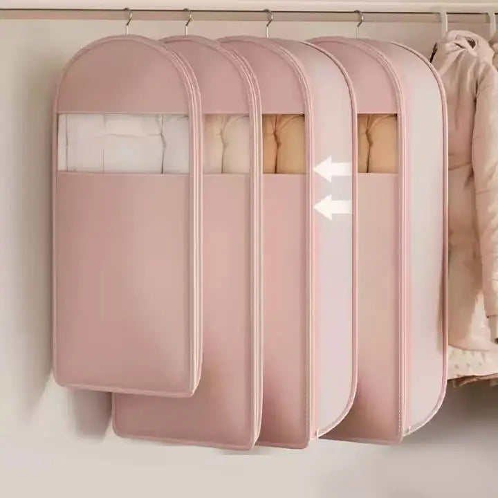Airtight hanging storage bag protecting jackets and sweaters in wardrobe