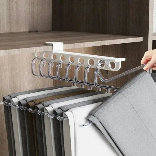 Space saving trouser holder mounted inside wardrobe