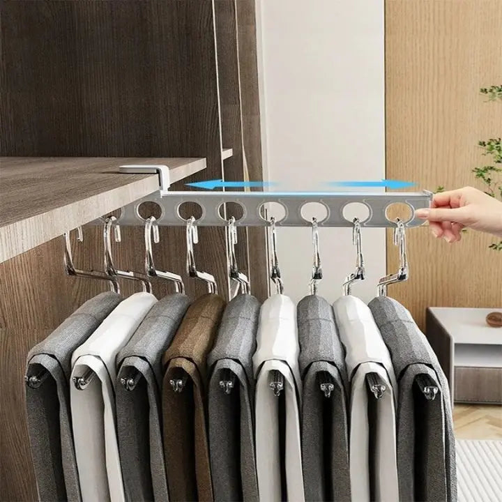 Space saving trouser holder mounted inside wardrobe