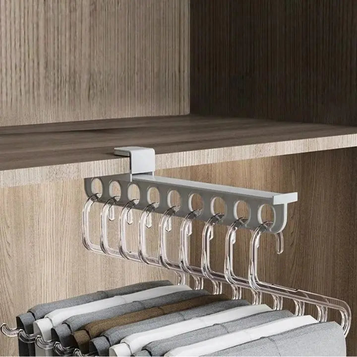 Space saving trouser holder mounted inside wardrobe