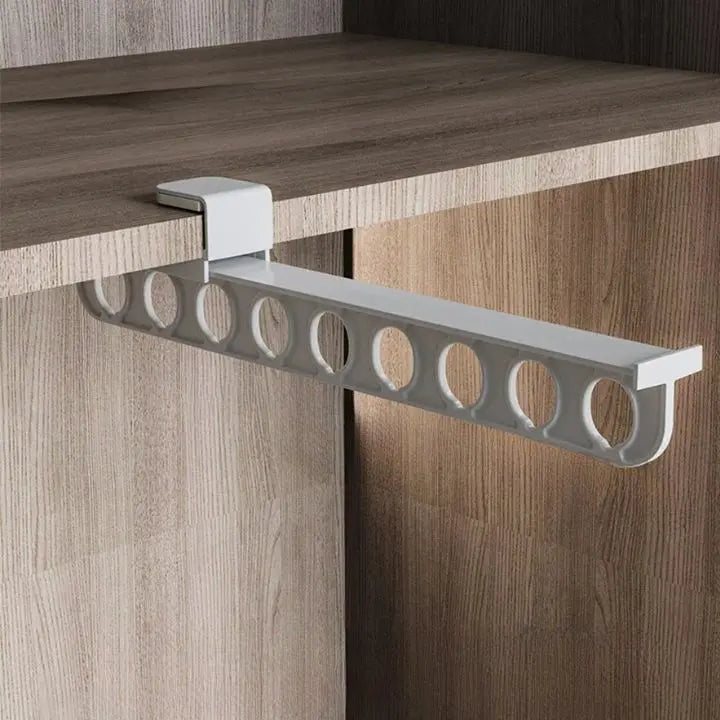 Space saving trouser holder mounted inside wardrobe