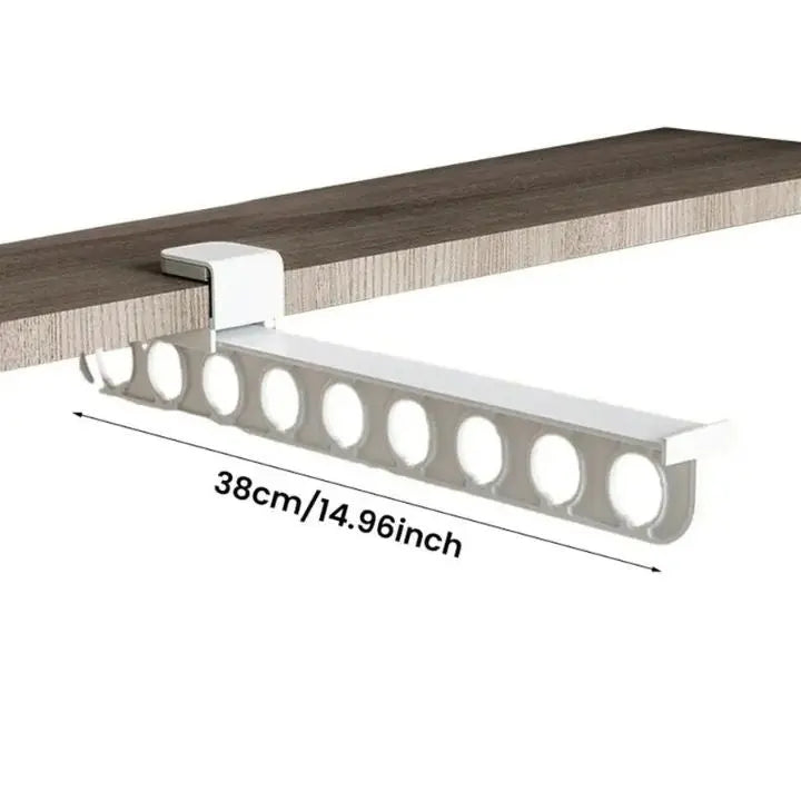 Space saving trouser holder mounted inside wardrobe