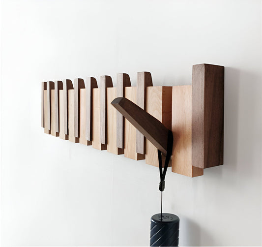 Decorative wooden wall hook shelf in entryway