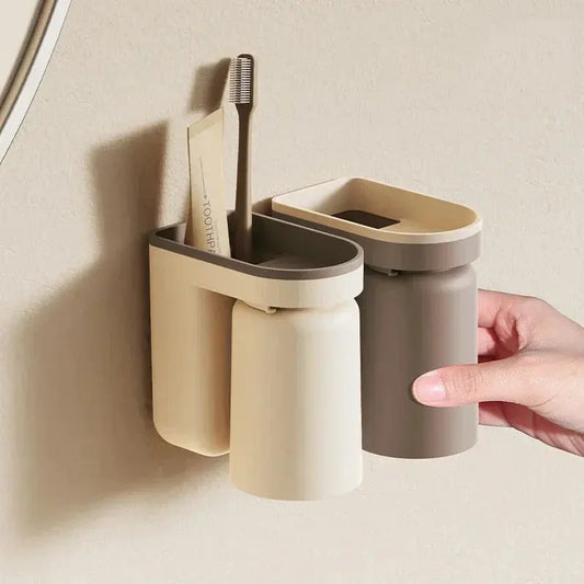 Wall mounted toothbrush and cup holder with drainage