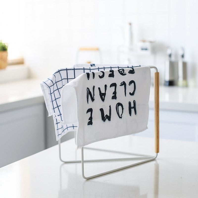 Scandinavian style countertop towel holder in kitchen
