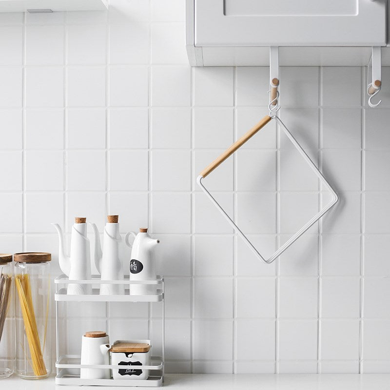 Scandinavian style countertop towel holder in kitchen
